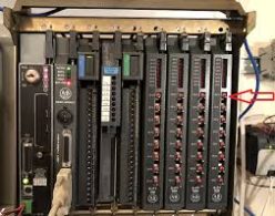 Legacy PLC rack requiring migration from obsolete industrial automation hardware