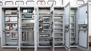Industrial PLC control cabinet with automation hardware